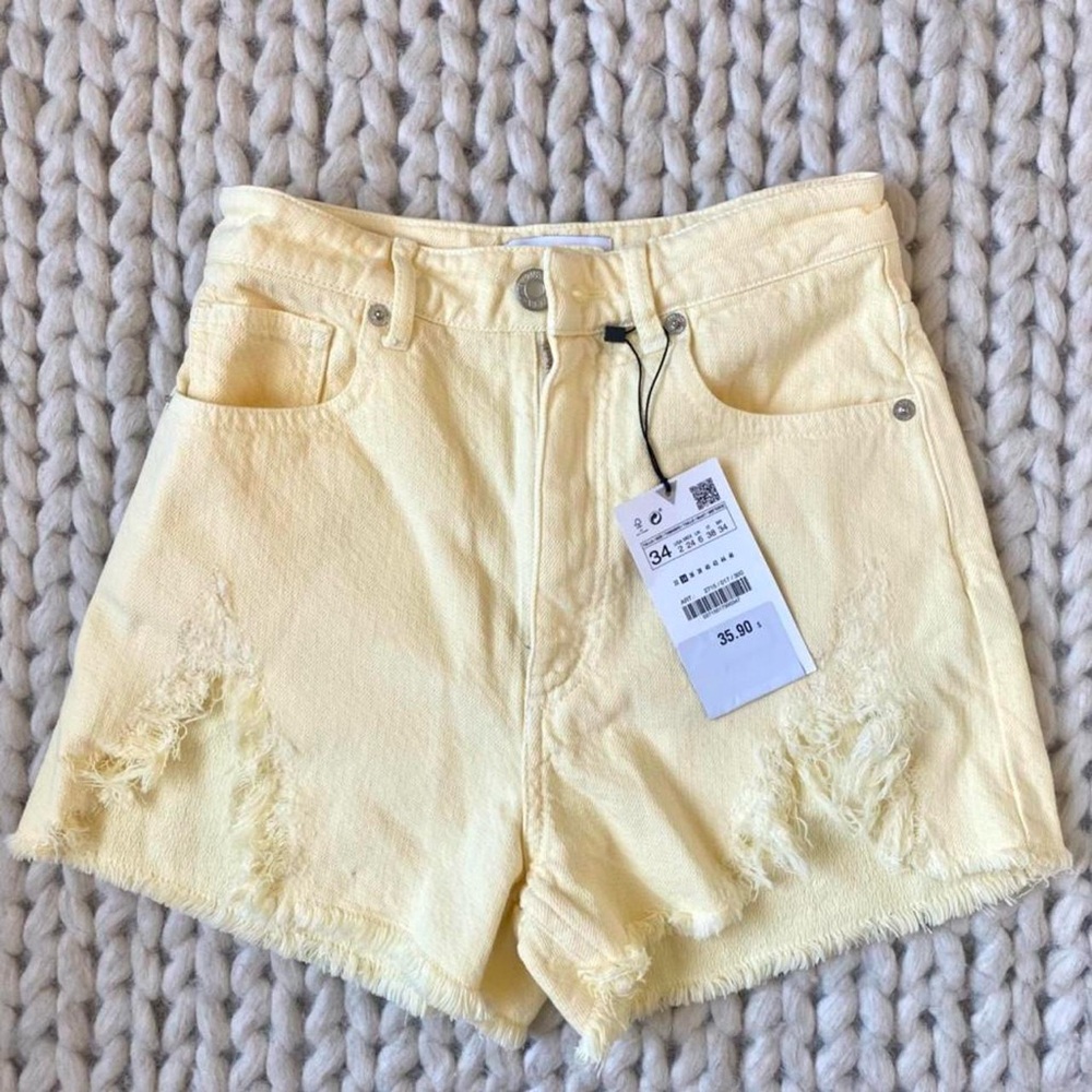 Zara high waisted denim shorts. Light yellow with distressed detailing. Size 2.